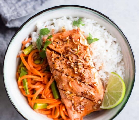 Lemongrass Roasted Salmon Plate of roasted salmon with side of rice and vegetables