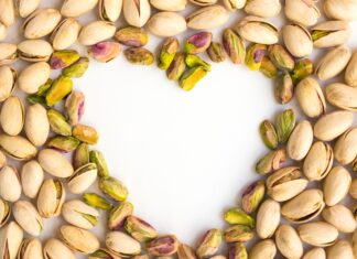Pistachios: Get Crackin’ for Better Health Pistachios arranged to make the outline of a heart
