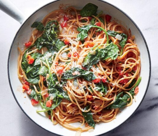 One-Pot Pasta With Spinach and Tomatoes Pan loaded with spinach and tomato pasta