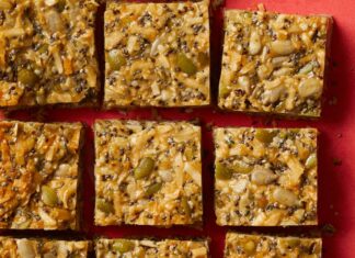 Super-Seeds Snack Bar Plate of medicinal seeds snack bars cut into nine squares like a Tic-Tac-Toe board
